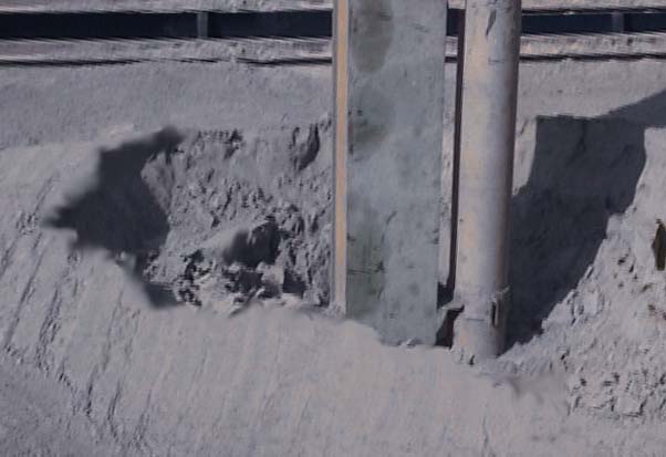 Suction of Powdered Material